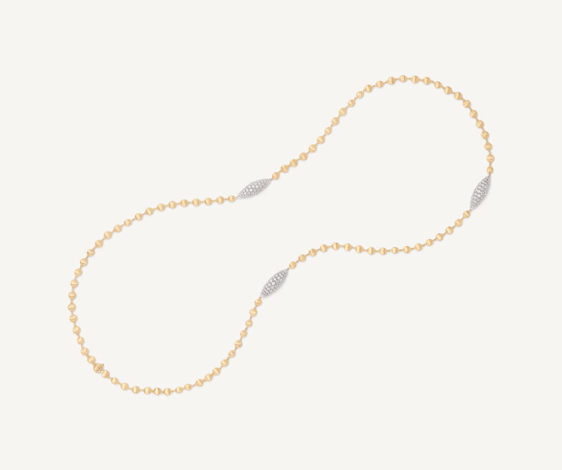 AFRICA ALTA 
Collana lunga in oro giallo con sfere ed elementi in pavé di diamanti
